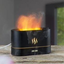 Böttcher-AG Diffuser Mit Flammeneffekt, Schwarz, Für ätherische Öle, Kunststoff, Warm-weißes LED -Drogerie - Gesundheit Geschäft e3dd15df85ede28a1de3dc3affbbdaddc11f90cb diffuser boettcher ag mit flammeneffekt schwarz